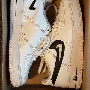 Nike White and Black Sneakers Iconic Design